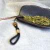 Tortoiseshell-shaped ceramic tea scoop with a copper handle - Image 3